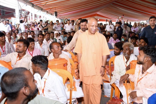 ddressed thousands of people gathered at the flood relief center