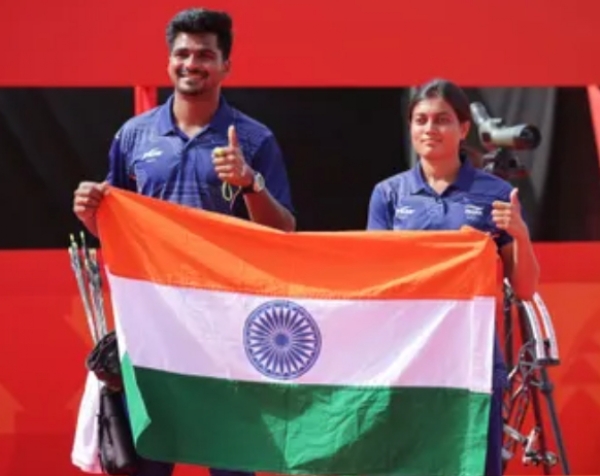Indian archers Chikita Taniparthi and Sahil Jadhav, representing India with precision, determination, and pride.