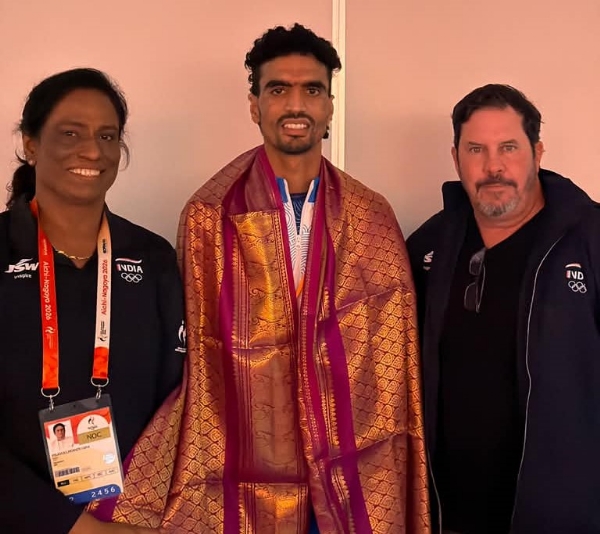 Gulveer Singh with American coach Scott Simmons and Indian Olympic Association President P. T. Usha.