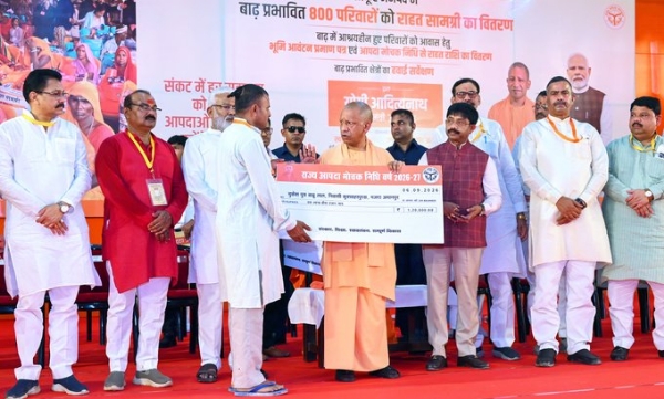 In Chitrakoot district, UP CM during prog organized for distribution of relief materials to flood-affected families In Chitrakoot district, UP CM during prog organized for distribution of relief materials to flood-affected families